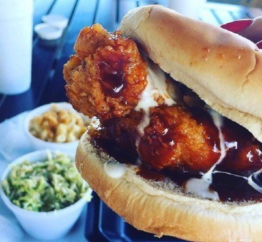 a close up of a hot dog on a bun